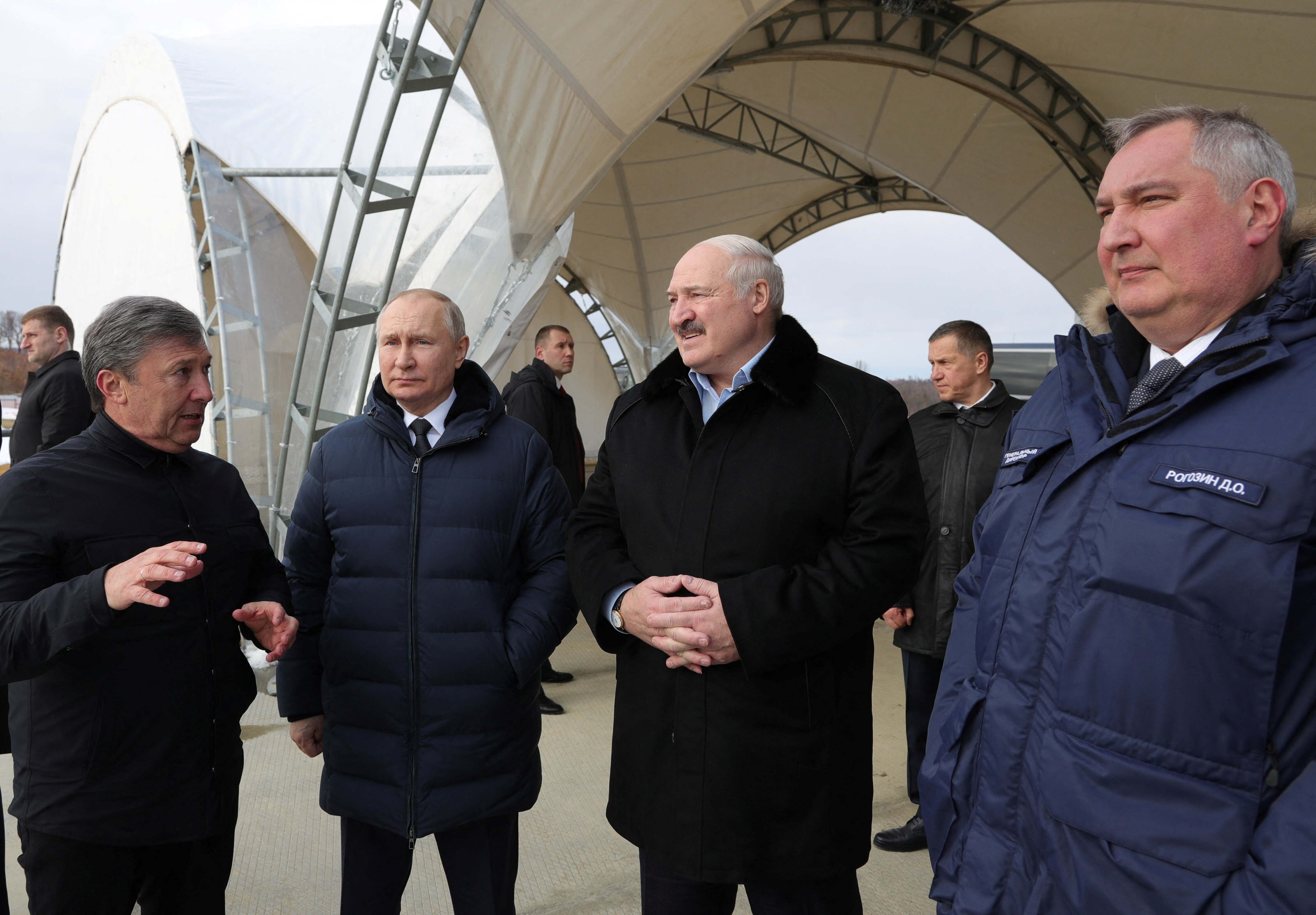 Russian President Vladimir Putin, his Belarusian counterpart Alexander Lukashenko and director general of Roscosmos Dmitry Rogozin visit the construction site of the Amur launch complex for Angara rockets at the Vostochny Cosmodrome in Amur Region, Russia April 12, 2022. (Sputnik/Mikhail Klimentyev/Kremlin via REUTERS)