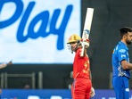 Pune: Shikhar Dhawan of Punjab Kings raises his bat after scoring a fifty during the Indian Premier League 2022 cricket match between Mumbai Indians and Punjab Kings, at the MCA International Stadium in Pune, Wednesday, April 13, 2022. (Sportzpics/PTI Photo) (PTI04_13_2022_000199B)(PTI)