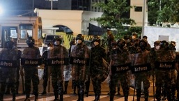 Sri Lanka protests: Air Force members stand guard in front of the Temple Trees Prime Minister Mahinda Rajapaksa's official residence during a protest, amid the country's economic crisis in Colombo.&nbsp;