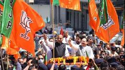 BJP president JP Nadda with Himachal Pradesh chief minister Jai Ram Thakur and other party leaders during a roadshow in Shimla on April 9. (Deepak Sansta/HT)