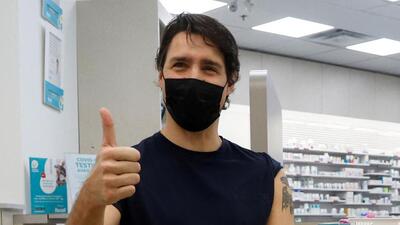 Canada's Prime Minister Justin Trudeau reacts after receiving his booster injection of a coronavirus disease (Covid-19) vaccine at a pharmacy in Ottawa, Ontario, Canada, on January 4. (REUTERS/ FILE) Canada's Prime Minister Justin Trudeau reacts after receiving his booster injection of a coronavirus disease (Covid-19) vaccine at a pharmacy in Ottawa, Ontario, Canada, on January 4. (REUTERS/ FILE)