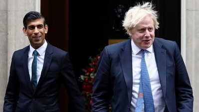 FILE PHOTO: British Prime Minister Boris Johnson and Chancellor of the Exchequer Rishi Sunak walk out of Downing Street. (REUTERS)