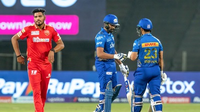 Pune: Rohit Sharma and Ishan Kishan of Mumbai Indians during the Indian Premier League 2022 cricket match between Mumbai Indians and Punjab Kings, at the MCA International Stadium in Pune, Wednesday, April 13, 2022. (Sportzpics/PTI Photo)  (PTI04_13_2022_000211A) (PTI)