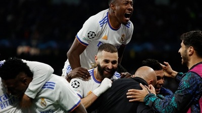 Champions League - Quarter Final - Second Leg - Real Madrid v Chelsea - Santiago Bernabeu, Madrid, Spain - April 12, 2022 Real Madrid's Karim Benzema celebrates scoring their second goal with teammates&nbsp; (REUTERS)