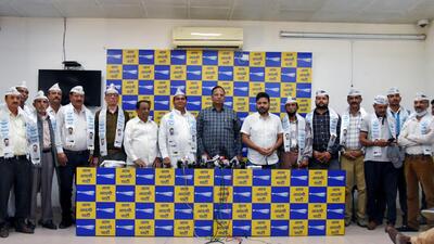 National executive member of BJP SC morcha & vice-president of BJP's Himachal Pradesh SC morcha, Harmel Dhiman, and other leaders pose for a picture with Delhi Minister of Health Satyendar Jain after joining Aam Aadmi Party (AAP), in New Delhi on Wednesday. (ANI) National executive member of BJP SC morcha & vice-president of BJP's Himachal Pradesh SC morcha, Harmel Dhiman, and other leaders pose for a picture with Delhi Minister of Health Satyendar Jain after joining Aam Aadmi Party (AAP), in New Delhi on Wednesday. (ANI)