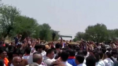 BJP team protests after not being allowed to visit violence-hit Karauli (ANI)