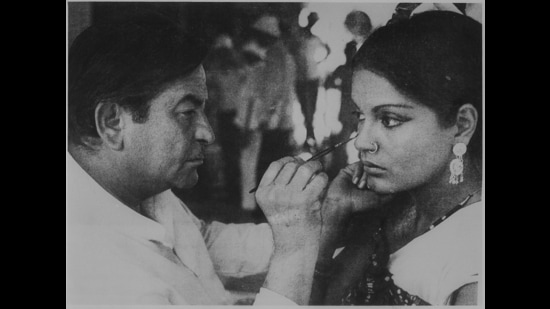 Raj Kapoor giving finishing touches to Zeenat Aman’s make up on the sets of Satyam Shivam Sundaram (1978). (HT Photo)