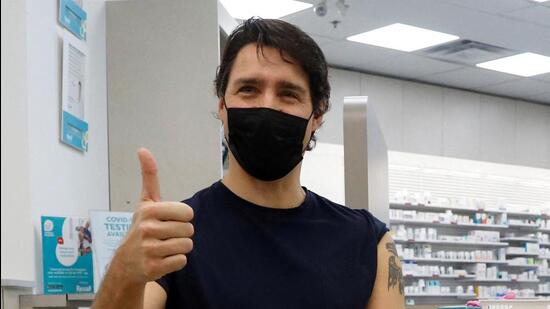Canada's Prime Minister Justin Trudeau reacts after receiving his booster injection of a coronavirus disease (Covid-19) vaccine at a pharmacy in Ottawa, Ontario, Canada, on January 4. (REUTERS/ FILE)