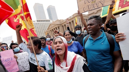 People shout slogans during a protests against Sri Lanka President Gotabaya Rajapaksa.(REUTERS)