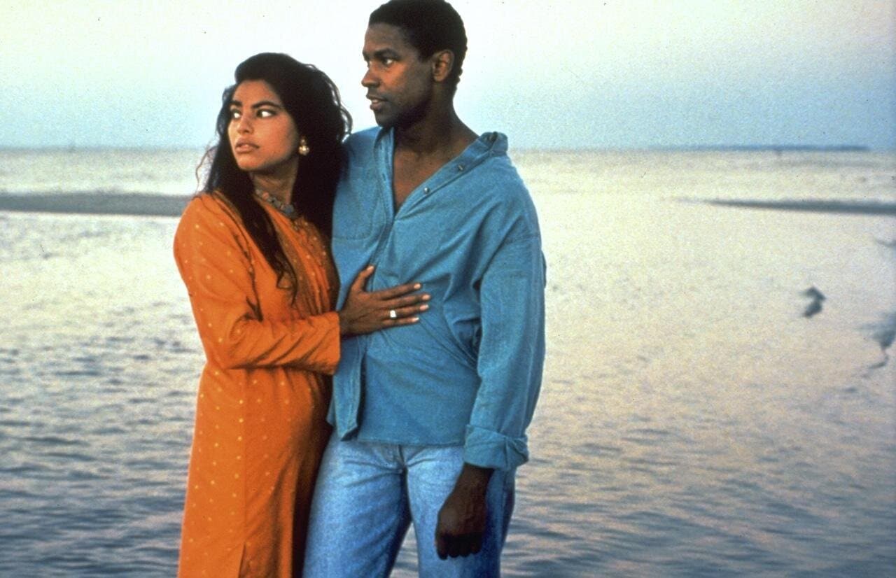 Sarita Choudhury and Denzel Washington in a still from Mississippi Masala