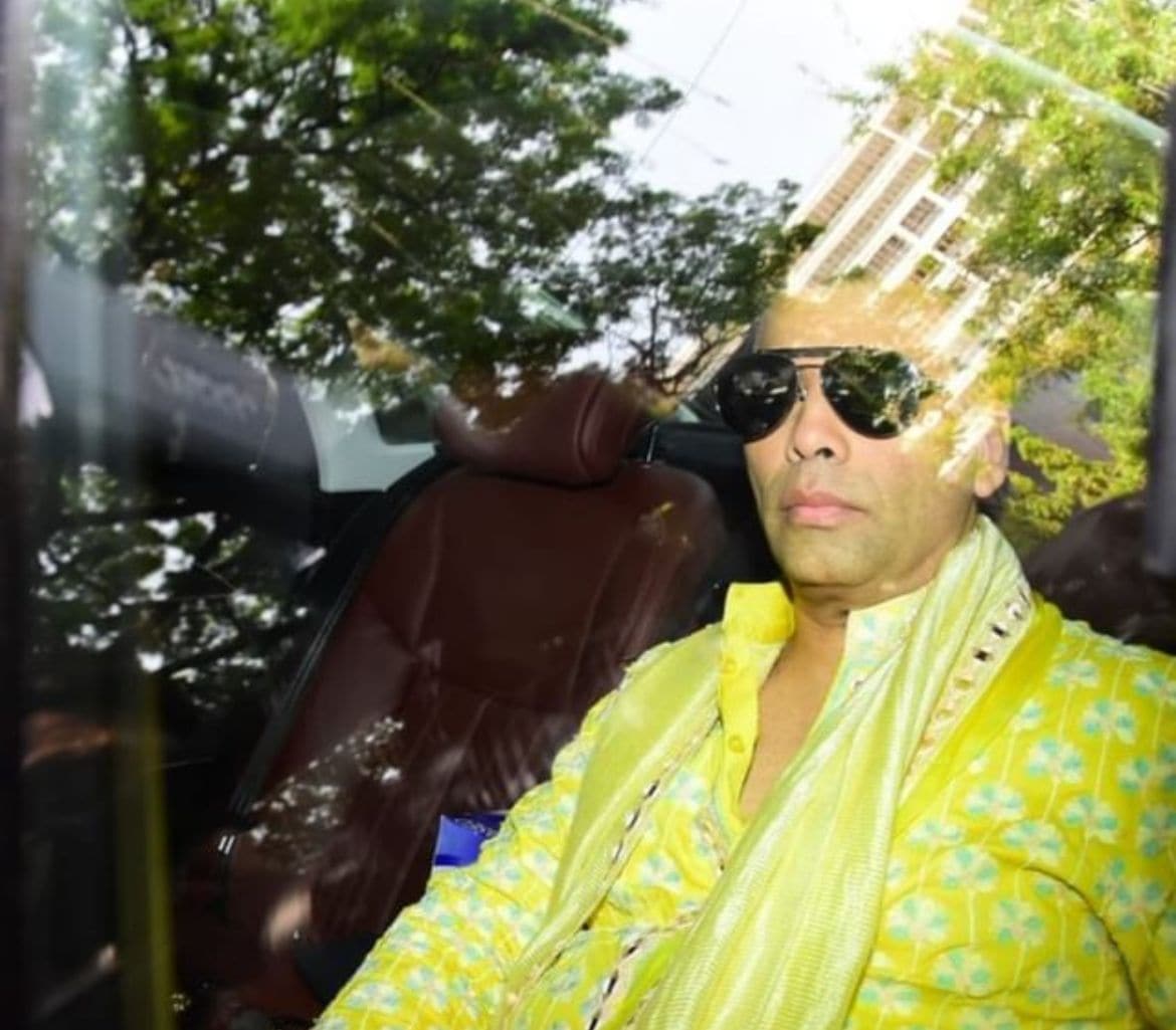 Karan Johar clicked in his car.