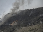 Smoke billows from the Ghazipur landfill where fires broke out at the landfill on March 28 and April 9. (Sakib Ali/HT Photo)