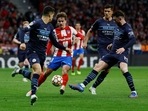 Champions League - Quarter Final - Second Leg - Atletico Madrid v Manchester City - Wanda Metropolitano, Madrid, Spain - April 13, 2022 Atletico Madrid's Antoine Griezmann in action with Manchester City's Aymeric Laporte