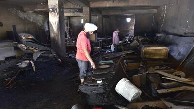 The gutted plywood unit located in Sham Nagar, Ludhiana, on Thursday. (Gurpreet Singh/HT)