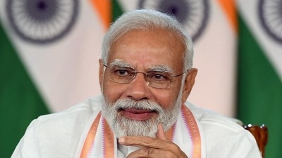 Prime Minister Narendra Modi interacts with the personnel of IAF, Indian Army, NDRF, ITBP, local administration and civil society, who were involved with rescue operations at Deoghar, through video conferencing, in New Delhi on Wednesday. (ANI) Prime Minister Narendra Modi interacts with the personnel of IAF, Indian Army, NDRF, ITBP, local administration and civil society, who were involved with rescue operations at Deoghar, through video conferencing, in New Delhi on Wednesday. (ANI)