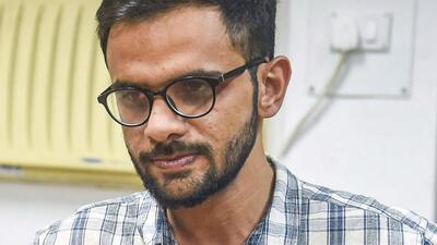 **EDS: FILE PHOTO** Mumbai: In this Monday, Dec. 30, 2019 file photo, Social activists Yogendra Yadav and Umar Khalid attend a press conference, in Mumbai. Khalid was denied bail in a case relating to the 2020 Northeast Delhi violence by the Karkardooma Court, in New Delhi, Thursday, March 24, 2022. (PTI Photo/Shashank Parade)(PTI03_24_2022_000081B) (PTI) **EDS: FILE PHOTO** Mumbai: In this Monday, Dec. 30, 2019 file photo, Social activists Yogendra Yadav and Umar Khalid attend a press conference, in Mumbai. Khalid was denied bail in a case relating to the 2020 Northeast Delhi violence by the Karkardooma Court, in New Delhi, Thursday, March 24, 2022. (PTI Photo/Shashank Parade)(PTI03_24_2022_000081B) (PTI)