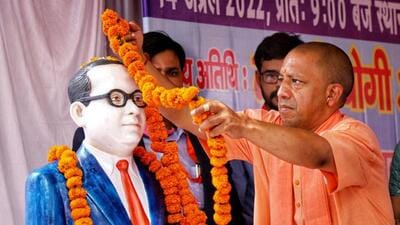 Uttar Pradesh chief minister Yogi Adityanath offering floral tribute to a bust of Dr BR Ambedkar in Lucknow. (ANI PHOTO) Uttar Pradesh chief minister Yogi Adityanath offering floral tribute to a bust of Dr BR Ambedkar in Lucknow. (ANI PHOTO)