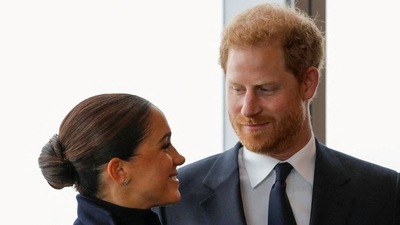 Britain's Prince Harry and Meghan, Duke and Duchess of Sussex, look at each other during a visit to One World Trade Center in Manhattan, New York City, US. (REUTERS)