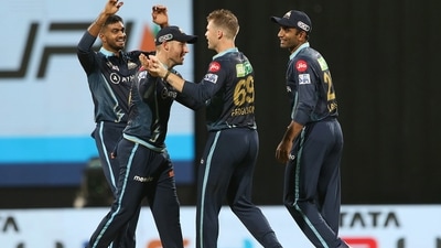 Lockie Ferguson of Gujarat Titans celebrates after taking the wicket of R. Ashwin of Rajasthan Royals during the Indian Premier League 2022 match (PTI)