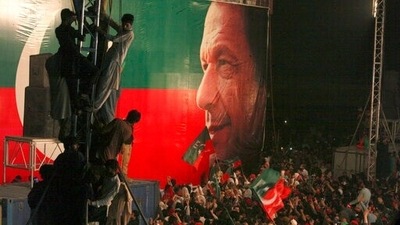 Supporters of former Pakistani Prime Minister Imran Khan attend an anti government rally, in Peshawar, Pakistan. (AP)