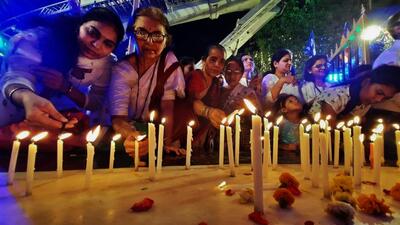 Thane, India - April 14, 2022: Ambedkarites pay their respects to Bharatratna Dr. Babasaheb Ambedkar by lighting candles at his statue on the occasion of his 131st birth anniversary at Court Naka, in Thane, Mumbai, India, on Thursday, April 14, 2022. (Praful Gangurde/HT Photo) (HT PHOTO)