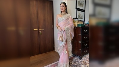 Kareena Kapoor's timeless saree is from Manish Malhotra's Summer Couture 2022 collection. She teamed her look with a matching potli. (Instagram/@manishmalhotra05) Kareena Kapoor's timeless saree is from Manish Malhotra's Summer Couture 2022 collection. She teamed her look with a matching potli. (Instagram/@manishmalhotra05)