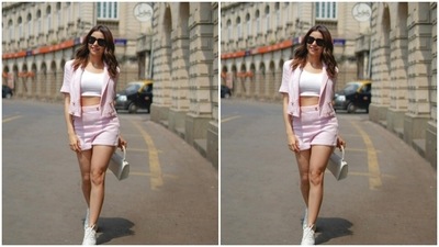 Aamna paired a white tube top with a pastel pink cropped blazer and a pastel pink pair of shorts. (Instagram/@aamnasharifofficial)