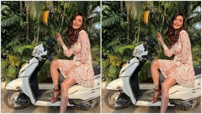Karishma’s summer looks are our fashion inspo. A few days back, Karishma looked super adorable in a pastel white and pink short dress. (Instagram/@karishmaktanna)