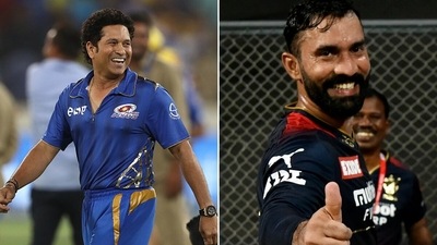 Dinesh Karthik acknowledged Sachin Tendulkar's ultimate praise for the RCB wicketkeeper batter. (Getty/Twitter) Dinesh Karthik acknowledged Sachin Tendulkar's ultimate praise for the RCB wicketkeeper batter. (Getty/Twitter)