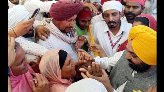 Punjab chief minister Bhagwant Mann (in yellow turban) thanking people for their blessings at Takht Damdama Sahib in Talwandi Sabo on Thursday. Later, he left for Jalandhar to take part in a function on Dr BR Ambedkar’s birth anniversary. (Sanjeev Kumar/HT)