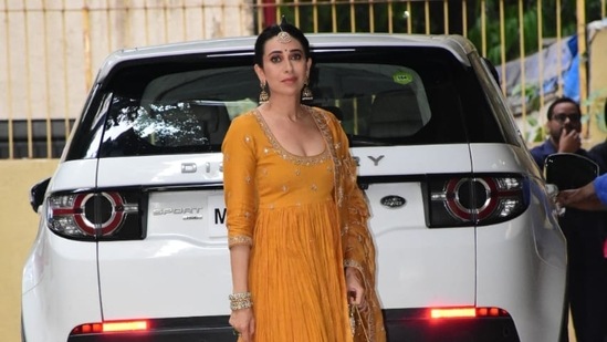Karisma Kapoor poses after the mehendi ceremony.