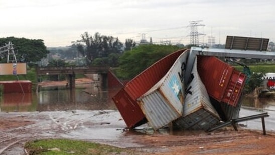 Shipping containers carried away and left in a jumbled pile by floods in Durban, on April 13, 2022.&nbsp;(AP)