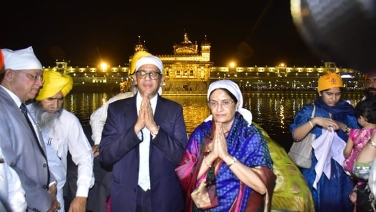 Chief Justice of India (CJI) NV Ramana is on a visit to Punjab with his family. On the eve of Baisakhi, he visited the Golden Temple in Amritsar to offer prayers.(HT Photo/Sameer Sehgal)