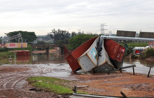 Shipping containers carried away and left in a jumbled pile by floods in Durban, on April 13, 2022. (AP) Shipping containers carried away and left in a jumbled pile by floods in Durban, on April 13, 2022. (AP)