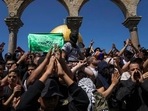 Palestinians chant slogans and wave Hamas flags during a protest against Israel, in front of the Dome of the Rock shrine at the Al Aqsa Mosque compound in Jerusalem's Old City.(AP) Palestinians chant slogans and wave Hamas flags during a protest against Israel, in front of the Dome of the Rock shrine at the Al Aqsa Mosque compound in Jerusalem's Old City.(AP)