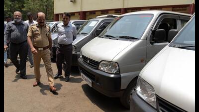 Navi Mumbai Commissioner of Police, Bipin Kumar Singh, inspects the vehicles following the arrest of three accused in stealing cars by making duplicate keys of petrol tanks. Navi Mumbai police have written to various agencies to keep RTO informed of all transactions of a vehicle. (BACHCHAN KUMAR/HT PHOTO)