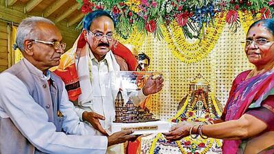 Vice-President Venkaiah Naidu and his wife being presented with a memento of the Ram Janmabhoomi temple in Ayodhya on Friday. (ANI PHOTO) Vice-President Venkaiah Naidu and his wife being presented with a memento of the Ram Janmabhoomi temple in Ayodhya on Friday. (ANI PHOTO)