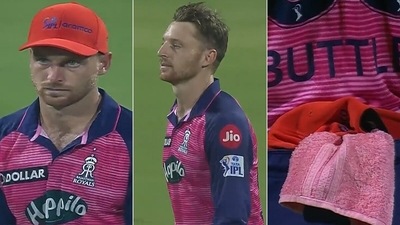 Jos Buttler was quick to take off the Orange Cap. (Screengrab) Jos Buttler was quick to take off the Orange Cap. (Screengrab)