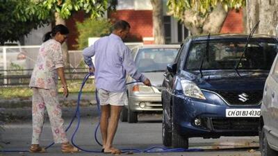 On the first day, Chandigarh residents found washing cars and irrigating lawns in the morning were fined ₹2,000. (HT File/Representational image) On the first day, Chandigarh residents found washing cars and irrigating lawns in the morning were fined ₹2,000. (HT File/Representational image)