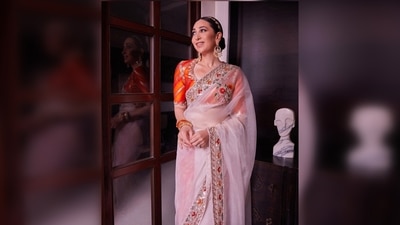 Karisma Kapoor's saree has been hand-embroidered in classic zari and has floral motifs. (Instagram/@manishmalhotraworld) Karisma Kapoor's saree has been hand-embroidered in classic zari and has floral motifs. (Instagram/@manishmalhotraworld)