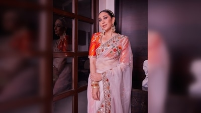 Karisma Kapoor did not compromise on her jewellery and wore gold chandbalis, bangles and a headband. (Instagram/@manishmalhotraworld) Karisma Kapoor did not compromise on her jewellery and wore gold chandbalis, bangles and a headband. (Instagram/@manishmalhotraworld)