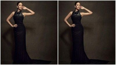Esha’s body-hugging gown came with a long black satin train. She accessorised her look with monochrome ear studs and white bracelet from the house of Mahesh Notandass Fine Jewellery. (Instagram/@egupta)