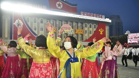 Students and youth attend a dancing party in celebration of the 110th birth anniversary of President Kim Il Sung, known as 'Day of the Sun', at Kim Il Sung Square in Pyongyang.(AFP)