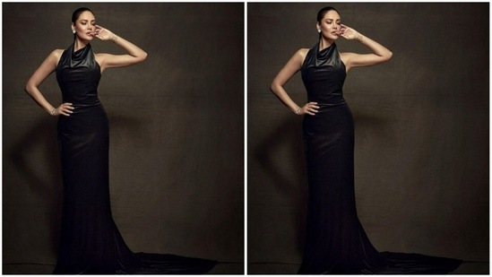Esha’s body-hugging gown came with a long black satin train. She accessorised her look with monochrome ear studs and white bracelet from the house of Mahesh Notandass Fine Jewellery.(Instagram/@egupta)