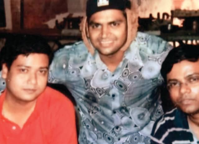 During his shoot days as an assistant director, with his team members During his shoot days as an assistant director, with his team members