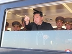 North Korean leader Kim Jong Un gestures as he watches the test-firing of a new-type tactical guided weapon according to state media, North Korea.