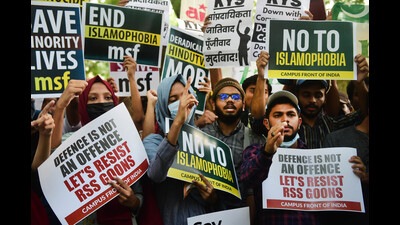 Members of Muslim Students' Federation Delhi University hold placards during their demonstration for communal harmony, love and secularism, at Jantar Mantar in New Delhi (PTI)