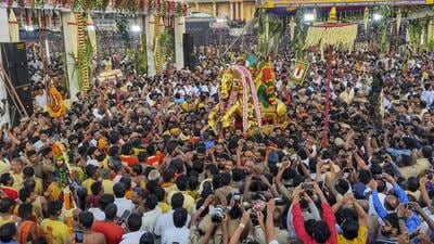 The 15-day Chithirai festival, which commenced on April 5 at the renowned Sri Meenakshi Sundareshwarar temple, saw lakhs of devotees crowding the Vaigai river bank from 4 am Saturday to watch the grand entry of Lord Kallazhagar into the river. (PTI) The 15-day Chithirai festival, which commenced on April 5 at the renowned Sri Meenakshi Sundareshwarar temple, saw lakhs of devotees crowding the Vaigai river bank from 4 am Saturday to watch the grand entry of Lord Kallazhagar into the river. (PTI)