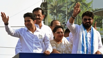 TMC leader Abhishek Banerjee with party candidate Babul Supriyo wave to the supporters during an election campaign for the upcoming Ballygunge Assembly bypoll, in Kolkata on Thursday. (ANI Photo) TMC leader Abhishek Banerjee with party candidate Babul Supriyo wave to the supporters during an election campaign for the upcoming Ballygunge Assembly bypoll, in Kolkata on Thursday. (ANI Photo)