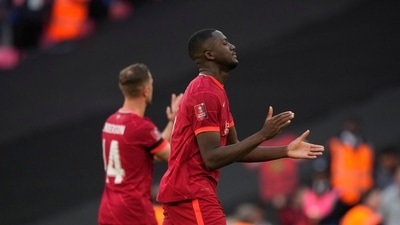 Liverpool's Ibrahima Konate, right, and Liverpool's Jordan Henderson applaud fans at the end of the English FA Cup semifinal (AP) Liverpool's Ibrahima Konate, right, and Liverpool's Jordan Henderson applaud fans at the end of the English FA Cup semifinal (AP)